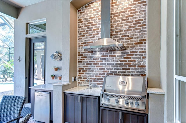 3212 Sunset Lakes Blvd, Land O Lakes, FL 34638 - kitchen with wall chimney exhaust hood, light stone countertops, and fridge