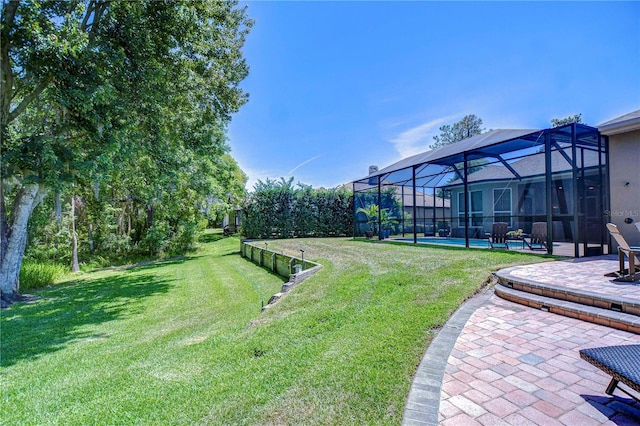 3212 Sunset Lakes Blvd, Land O Lakes, FL 34638 - view of green lawn featuring a patio, a swimming pool, and a lanai