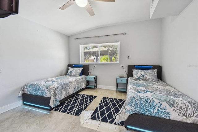 bedroom with baseboards, a ceiling fan, and lofted ceiling