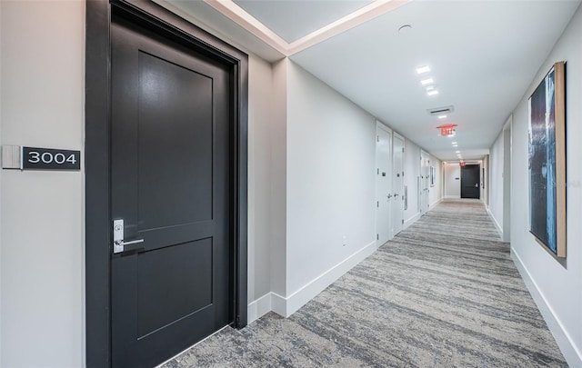 301 1st St S Unit 3004, Saint Petersburg, FL 33701 - hallway with visible vents, carpet flooring, and baseboards