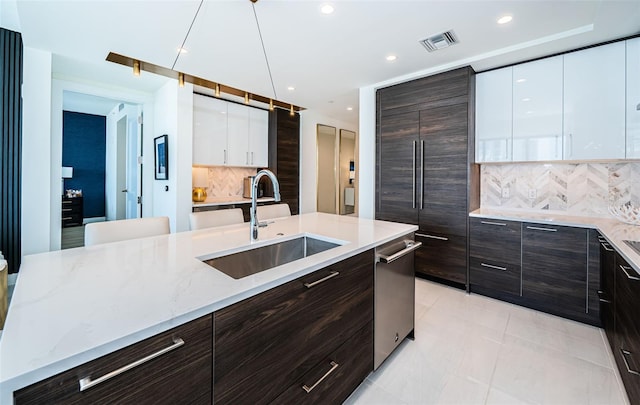 301 1st St S Unit 3004, Saint Petersburg, FL 33701 - kitchen featuring a sink, visible vents, decorative backsplash, modern cabinets, and dishwasher