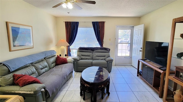 2213 Fluorshire Dr, Brandon, FL 33511 - living area with a textured ceiling and a ceiling fan