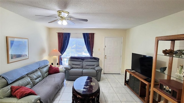 2213 Fluorshire Dr, Brandon, FL 33511 - living area featuring a ceiling fan, light tile patterned floors, and a textured ceiling