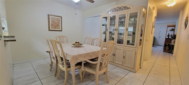 2213 Fluorshire Dr, Brandon, FL 33511 - dining room with a ceiling fan and light tile patterned floors