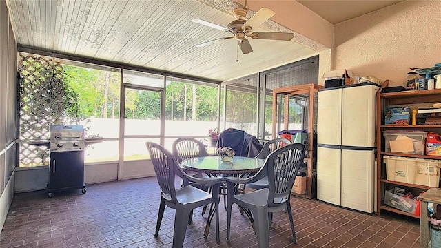 2213 Fluorshire Dr, Brandon, FL 33511 - sunroom / solarium with ceiling fan and outdoor dining area