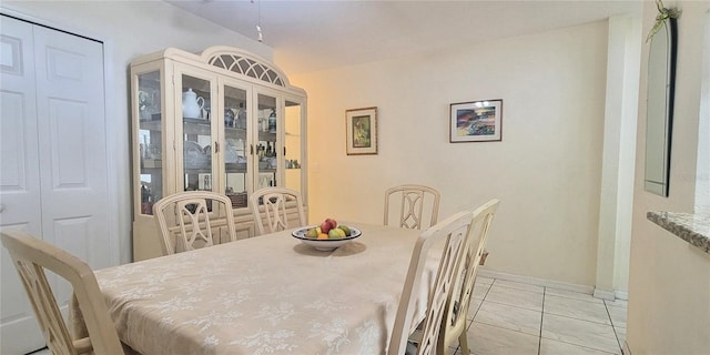 2213 Fluorshire Dr, Brandon, FL 33511 - dining space featuring light tile patterned floors and baseboards