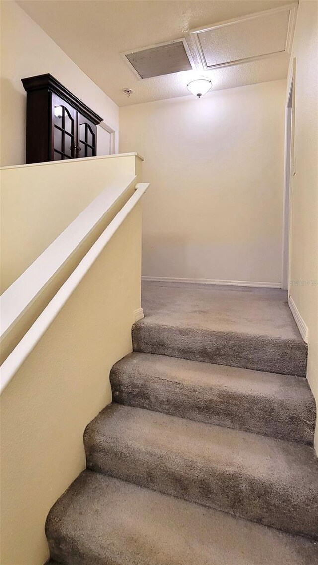2213 Fluorshire Dr, Brandon, FL 33511 - staircase with baseboards