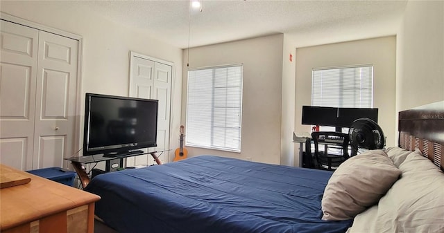 2213 Fluorshire Dr, Brandon, FL 33511 - bedroom with a textured ceiling