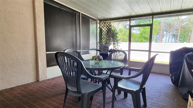 2213 Fluorshire Dr, Brandon, FL 33511 - sunroom / solarium with outdoor dining area