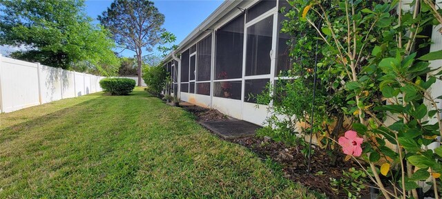 2213 Fluorshire Dr, Brandon, FL 33511 - view of yard featuring a sunroom