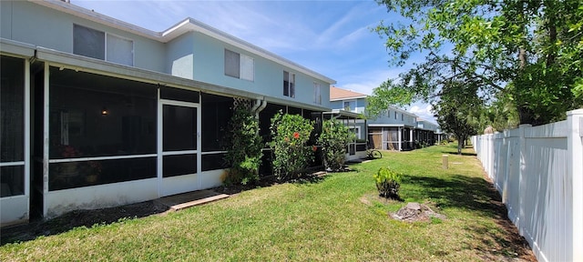 2213 Fluorshire Dr, Brandon, FL 33511 - view of yard featuring a sunroom