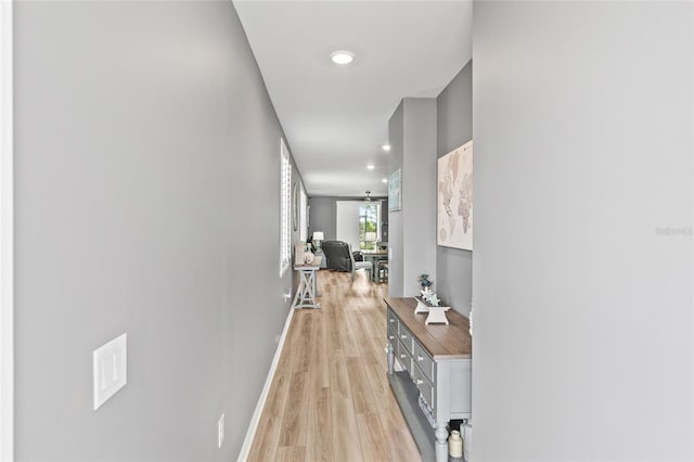 44239 Frontier Dr, Punta Gorda, FL 33982 - corridor featuring baseboards, light wood-type flooring, and recessed lighting
