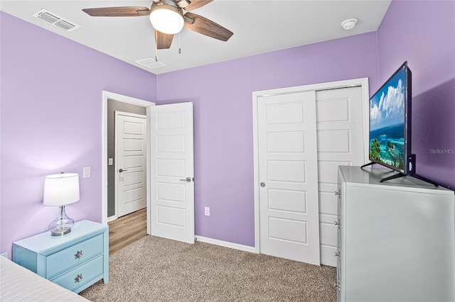 44239 Frontier Dr, Punta Gorda, FL 33982 - unfurnished bedroom with visible vents, a closet, baseboards, ceiling fan, and light colored carpet