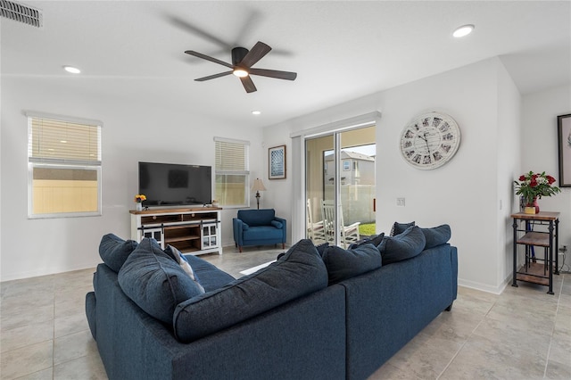 living room with recessed lighting, visible vents, and a ceiling fan