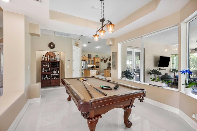 game room with light tile patterned floors, baseboards, a raised ceiling, and billiards