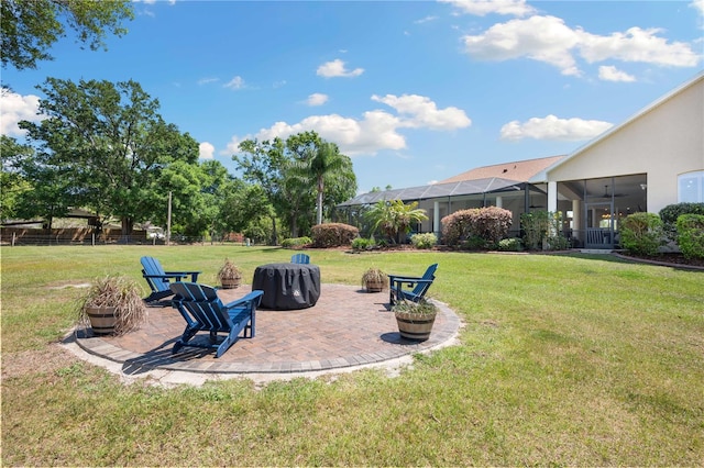 view of yard featuring a patio area and an outdoor fire pit