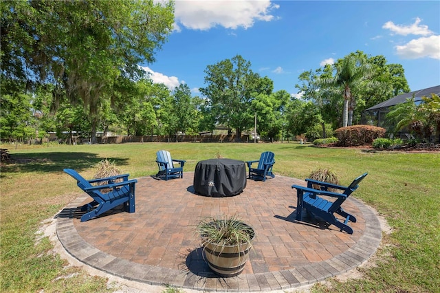 view of patio / terrace featuring an outdoor fire pit