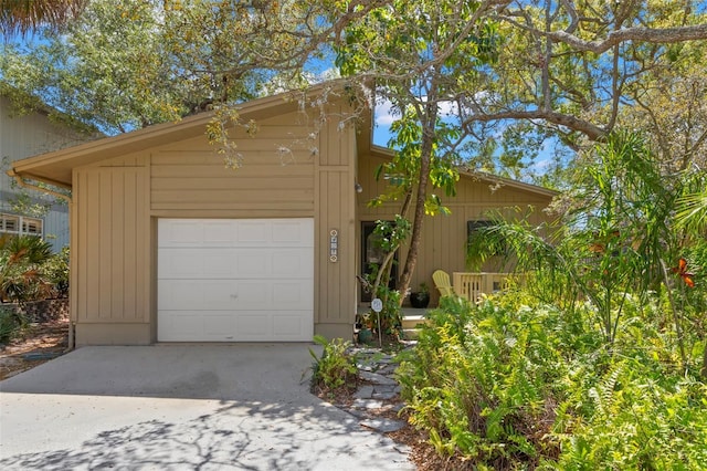 407 Indiana Ave, Crystal Beach, FL 34681 - garage featuring driveway