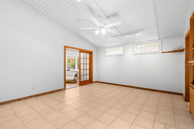 407 Indiana Ave, Crystal Beach, FL 34681 - empty room featuring ceiling fan, lofted ceiling with beams, track lighting, wooden ceiling, and baseboards
