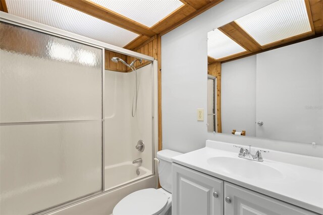 407 Indiana Ave, Crystal Beach, FL 34681 - full bathroom with toilet, vanity, and bath / shower combo with glass door