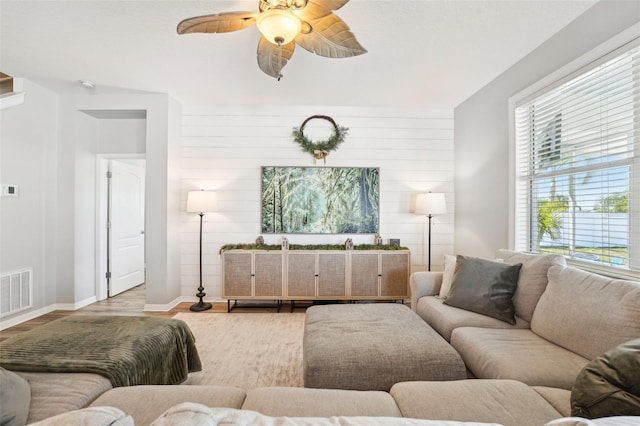 7207 Forest Mere Dr, Riverview, FL 33578 - living room featuring wood finished floors, ceiling fan, and baseboards