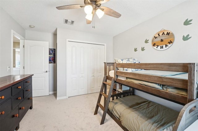 7207 Forest Mere Dr, Riverview, FL 33578 - bedroom with a closet, light colored carpet, a ceiling fan, and baseboards