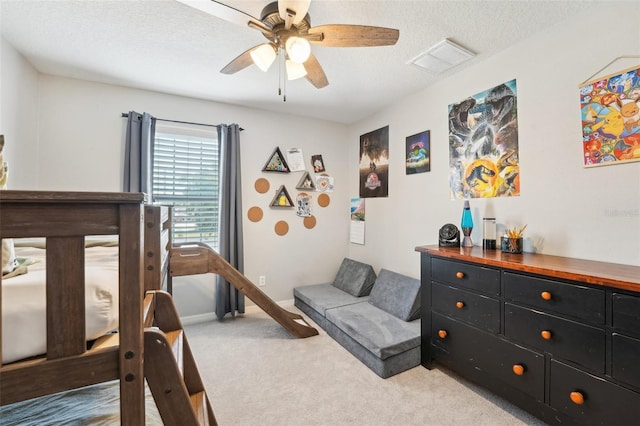 7207 Forest Mere Dr, Riverview, FL 33578 - bedroom with light colored carpet, a textured ceiling, ceiling fan, and baseboards