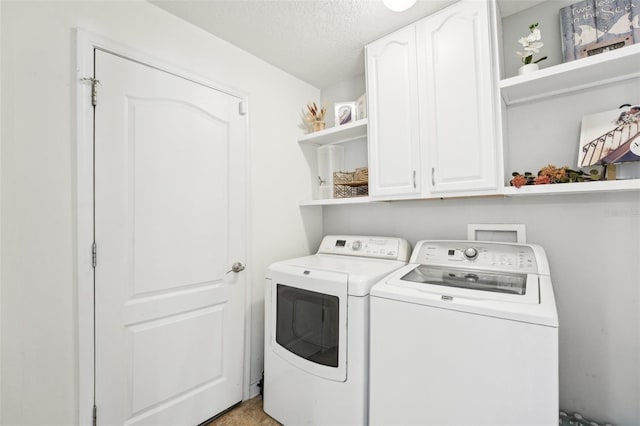 7207 Forest Mere Dr, Riverview, FL 33578 - laundry area featuring cabinet space, washer and clothes dryer, and a textured ceiling