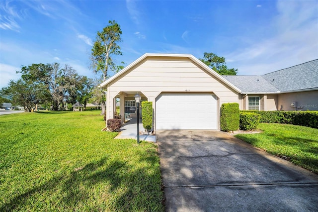 4819 Boonesboro Ct, New Port Richey, FL 34655 - view of front facade featuring an attached garage, concrete driveway, and a front lawn