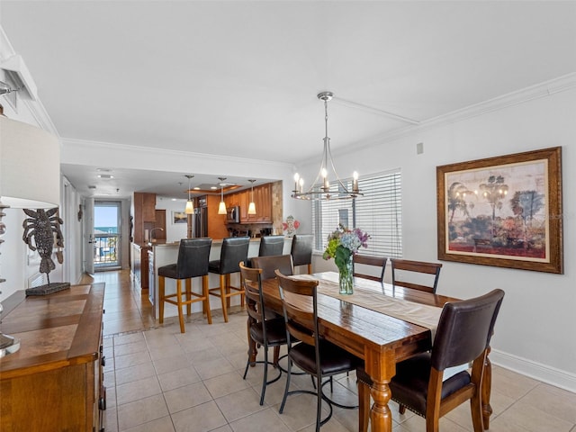 19925 Gulf Blvd Unit 402, Indian Shores, FL 33785 - dining area featuring ornamental molding, light tile patterned floors, baseboards, and a notable chandelier