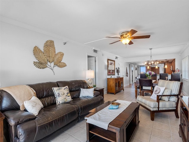 19925 Gulf Blvd Unit 402, Indian Shores, FL 33785 - living room featuring ceiling fan with notable chandelier, light tile patterned flooring, and ornamental molding