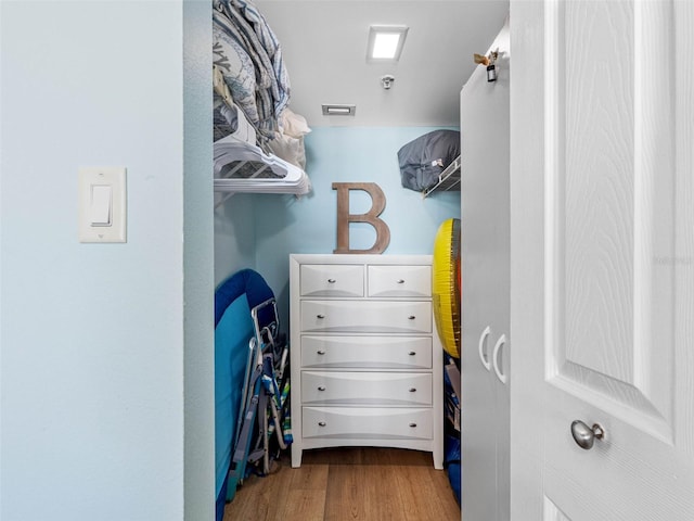 19925 Gulf Blvd Unit 402, Indian Shores, FL 33785 - spacious closet featuring wood finished floors