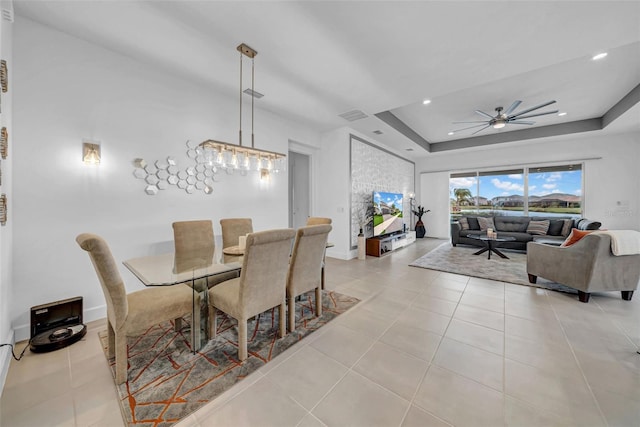 3096 Great Banyan Way, Wesley Chapel, FL 33543 - dining space with a tray ceiling, ceiling fan, light tile patterned flooring, recessed lighting, and baseboards