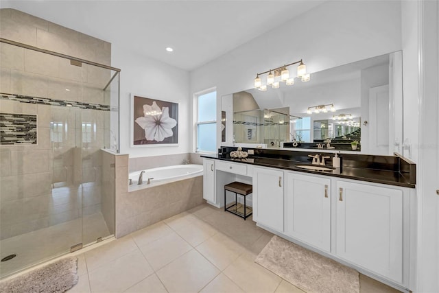 3096 Great Banyan Way, Wesley Chapel, FL 33543 - full bathroom with a stall shower, a garden tub, tile patterned flooring, and vanity