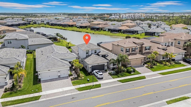 3096 Great Banyan Way, Wesley Chapel, FL 33543 - aerial view of residential area featuring a large body of water