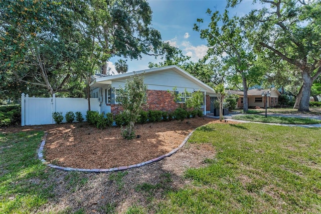 202 S Hesperides St, Tampa, FL 33609 - view of front facade with brick siding