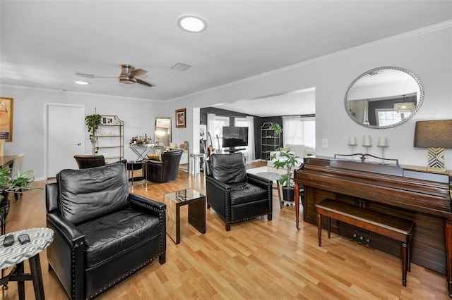 202 S Hesperides St, Tampa, FL 33609 - living room featuring light wood-style floors, a ceiling fan, crown molding, and recessed lighting