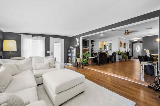 202 S Hesperides St, Tampa, FL 33609 - living room featuring wood finished floors, ceiling fan, and recessed lighting
