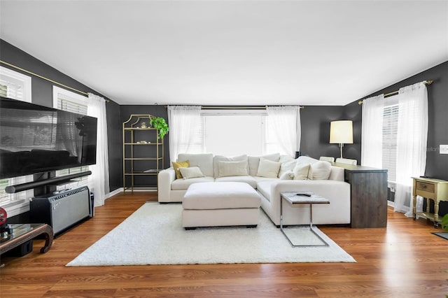 202 S Hesperides St, Tampa, FL 33609 - living area featuring healthy amount of natural light and wood finished floors
