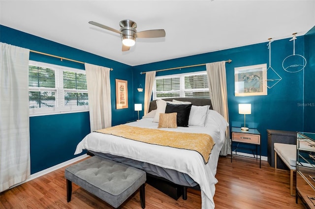202 S Hesperides St, Tampa, FL 33609 - bedroom featuring multiple windows, wood finished floors, and ceiling fan