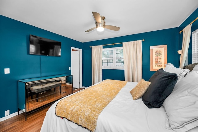 202 S Hesperides St, Tampa, FL 33609 - bedroom with wood finished floors and ceiling fan