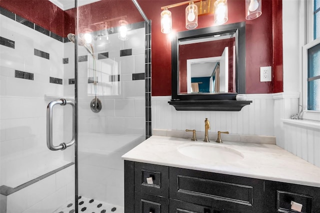202 S Hesperides St, Tampa, FL 33609 - full bath with vanity, a stall shower, and wainscoting