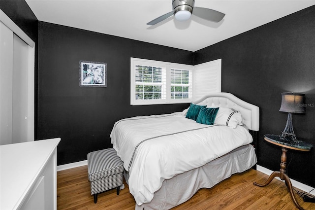 202 S Hesperides St, Tampa, FL 33609 - bedroom featuring wood finished floors, a closet, and ceiling fan