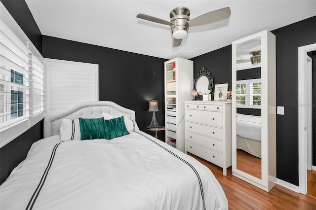 202 S Hesperides St, Tampa, FL 33609 - bedroom featuring wood finished floors and ceiling fan