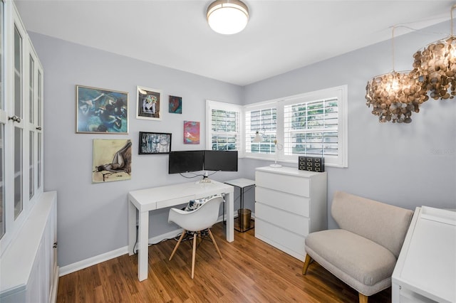 202 S Hesperides St, Tampa, FL 33609 - home office featuring wood finished floors and a chandelier