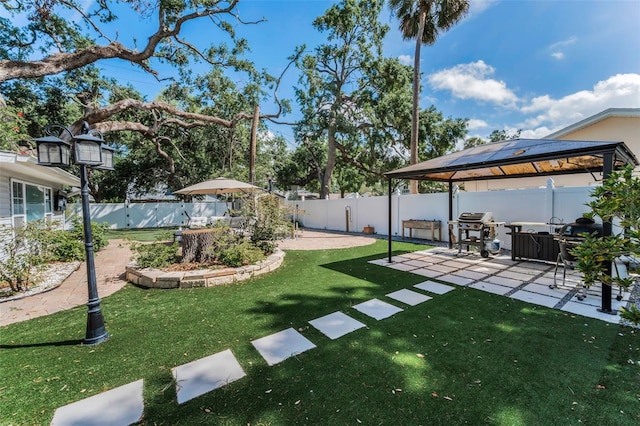 202 S Hesperides St, Tampa, FL 33609 - fenced backyard featuring a gazebo and a patio