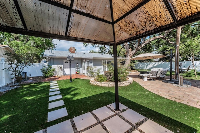 202 S Hesperides St, Tampa, FL 33609 - fenced backyard featuring a patio area and a gazebo