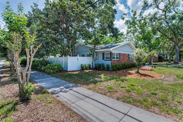 202 S Hesperides St, Tampa, FL 33609 - ranch-style house featuring brick siding