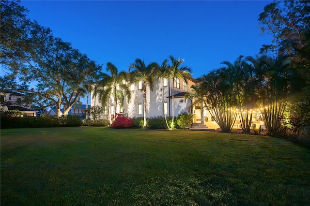 2501 S Dundee St, Tampa, FL 33629 - view of front of home with a front lawn and stucco siding
