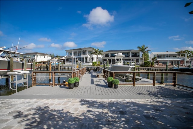 2501 S Dundee St, Tampa, FL 33629 - dock area with boat lift, a water view, and a residential view